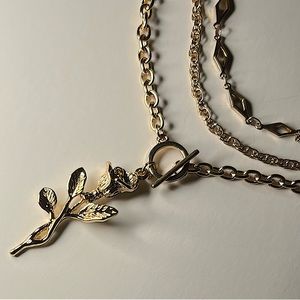 Gold Tinted Multi-Strand Necklace with Rose Pendent